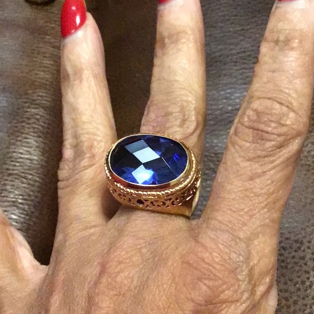 EUC,JOAN BOYCE SIZE 7, Tanzanite faceted gem,rose gold plating,east/west design